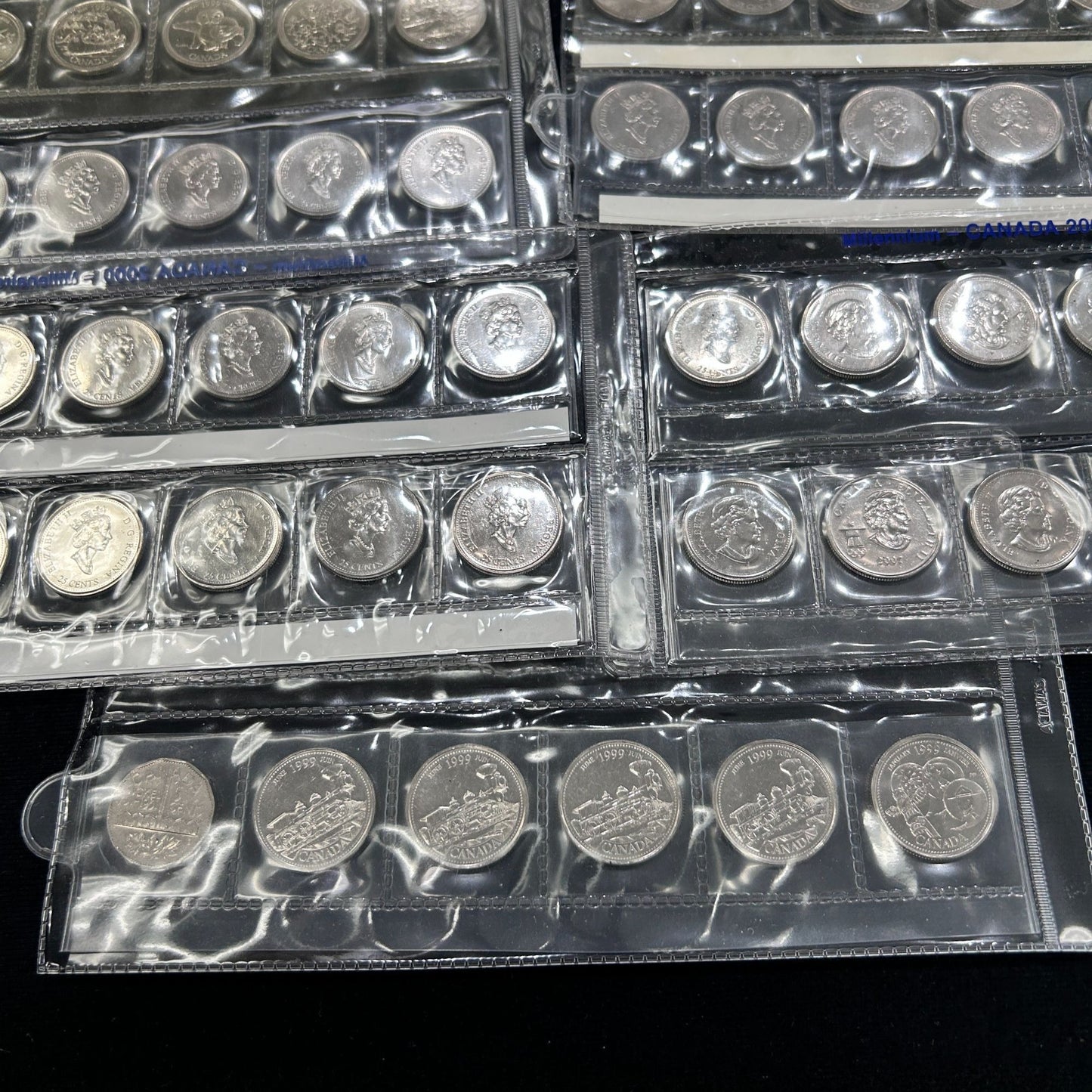 Lot of 78, 1999/2000 Canadian Millennium Quarters - Mint in Plastic