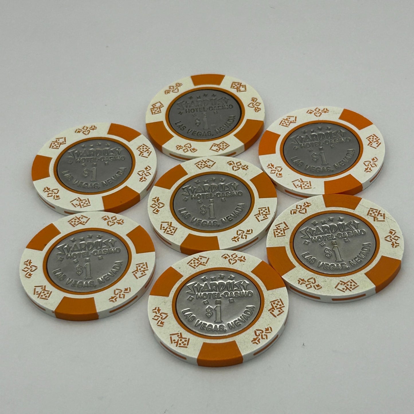 Lot of 7 1985 Stardust Casino Las Vegas Nevada $1 Chips