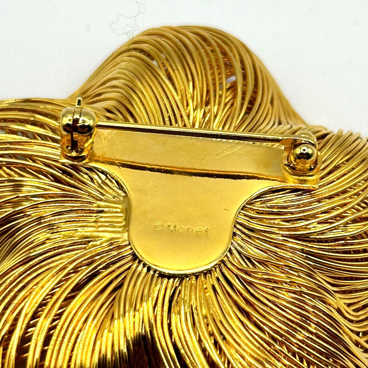 Vintage Monet Gold Plated Spun Wired Flower with Rhinestones Center Brooch