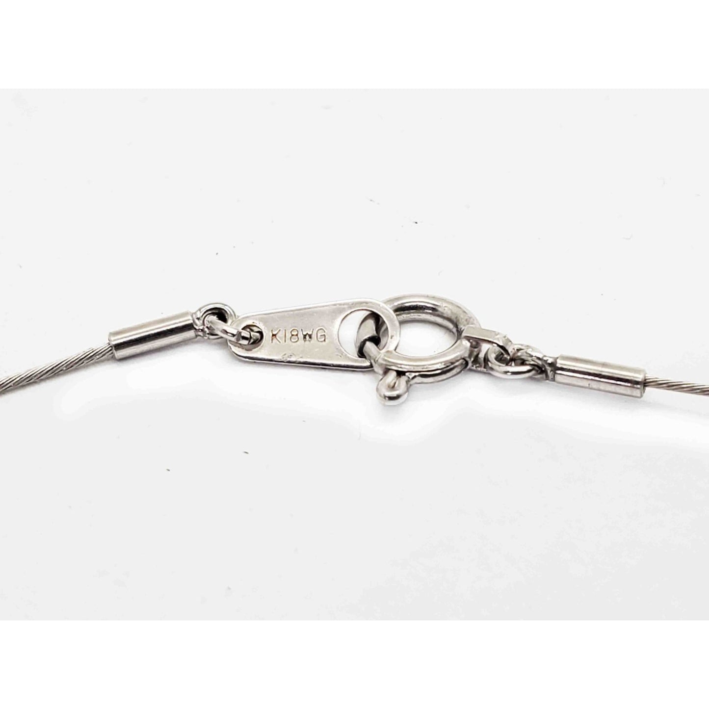 0.1 ctw Diamond V2000 Platinum Charm Pendant on 18k White Gold Chain