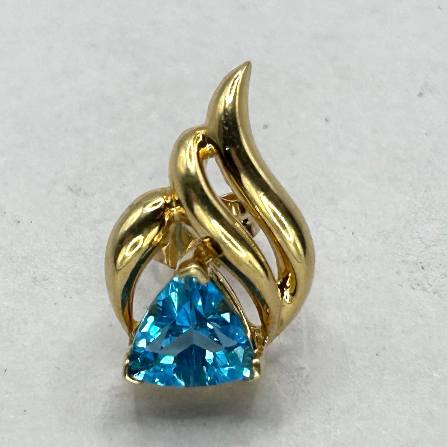 6.8mm Trillion Cut Blue Topaz 14k Yellow Gold Swirl Stud Earrings