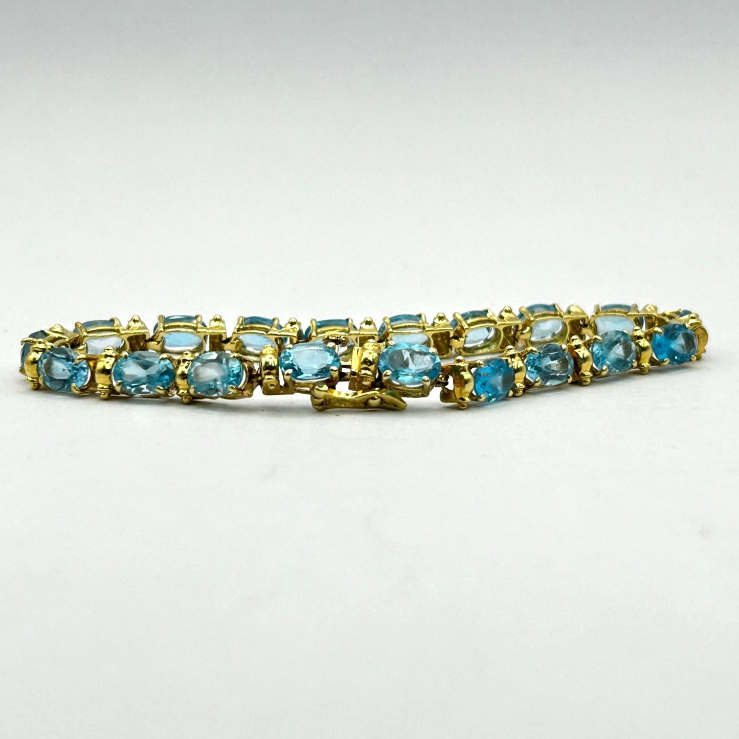 Blue Topaz Gemstone 14k Gold 7.5" Tennis Bracelet - 19 Stones