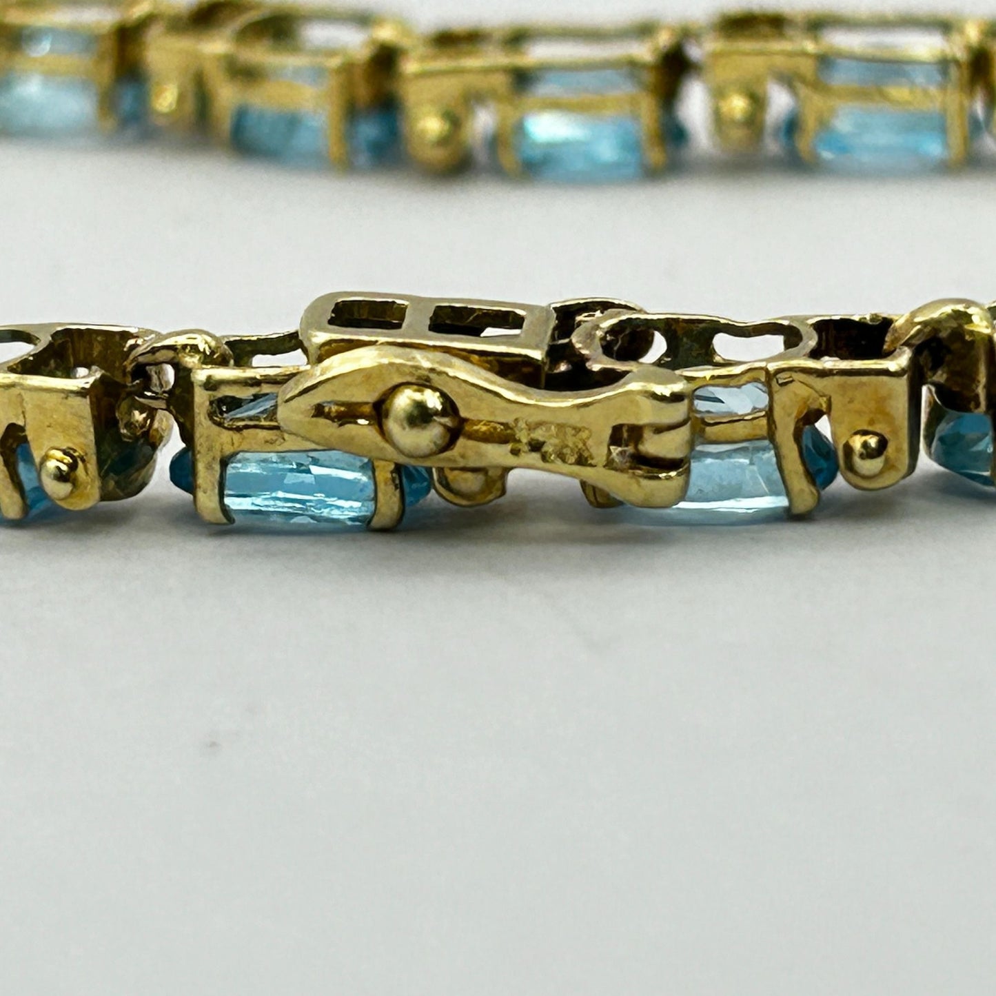 Blue Topaz Gemstone 14k Gold 7.5" Tennis Bracelet - 19 Stones
