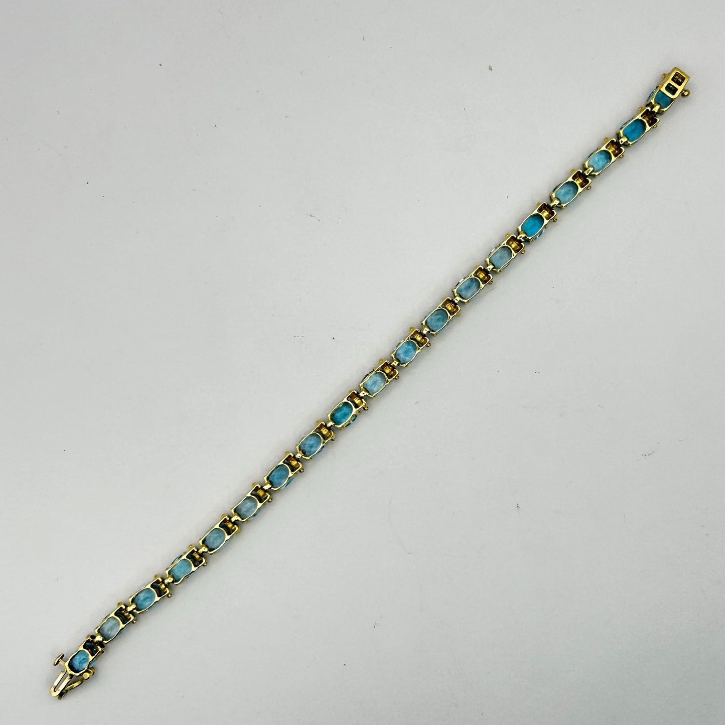 Blue Topaz Gemstone 14k Gold 7.5" Tennis Bracelet - 19 Stones