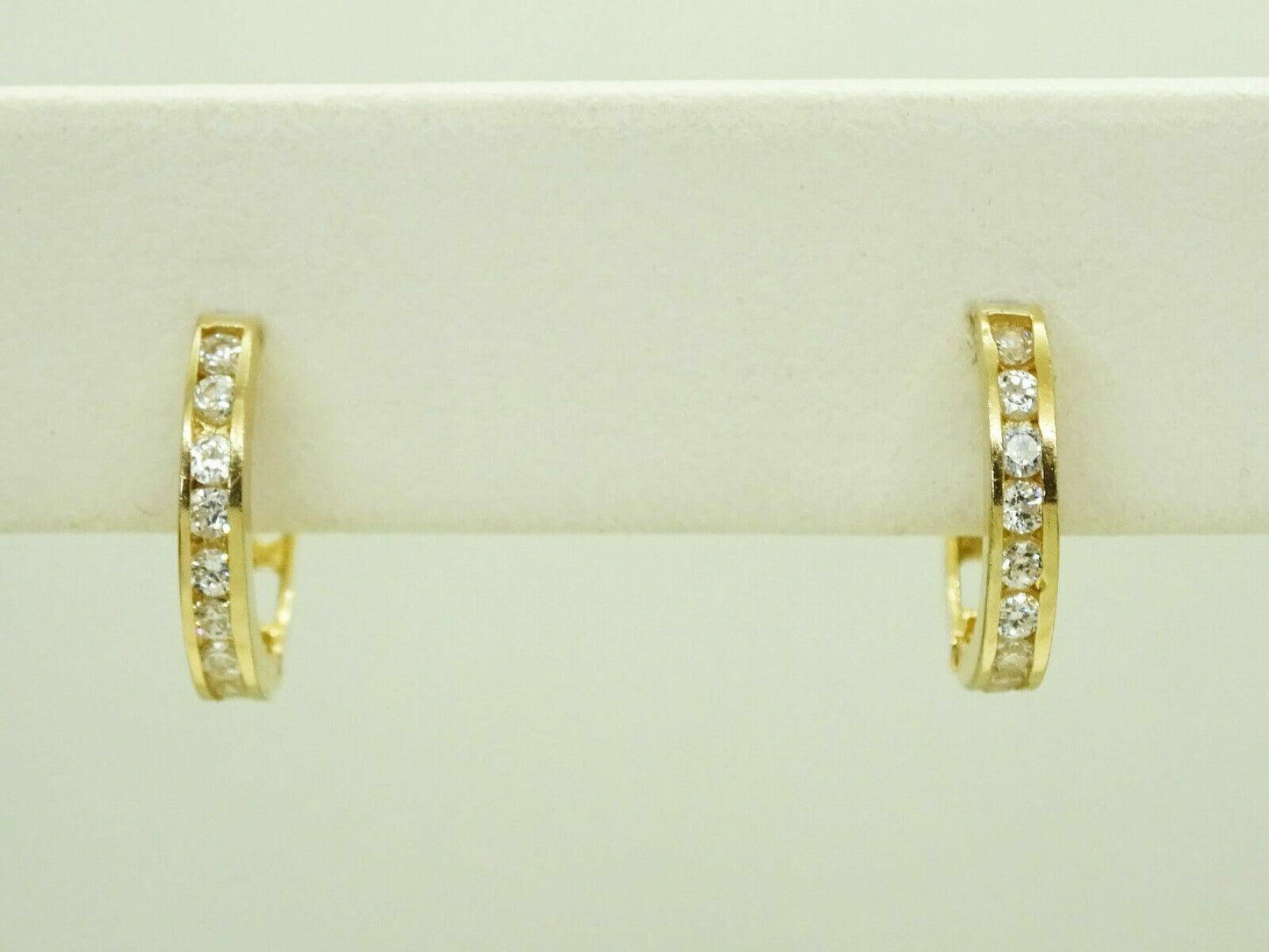 Mini CZ Huggie Hoop Earrings 14k Gold