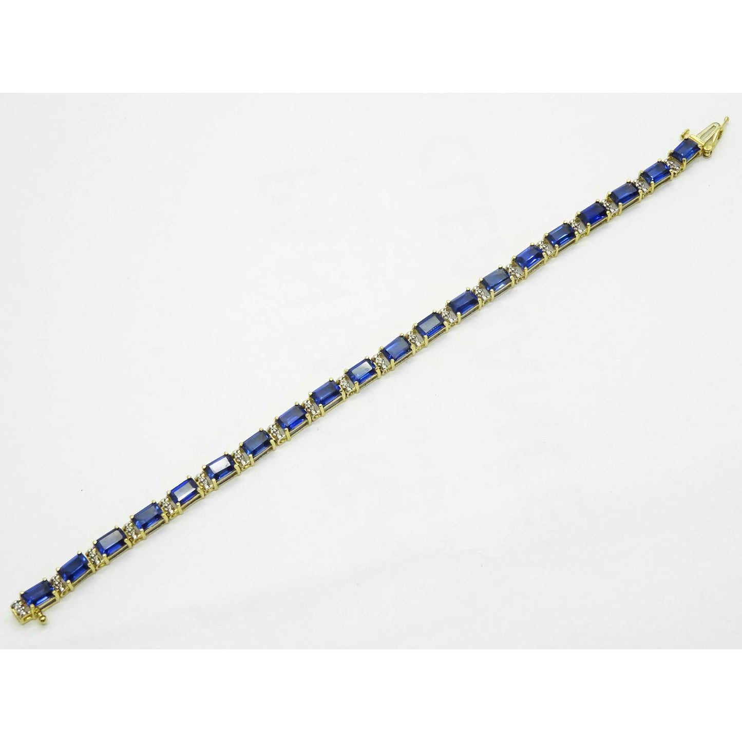 Lab-Created Em-Cut Sapphire & Natural Diamond Accent Tennis Bracelet 10k Gold