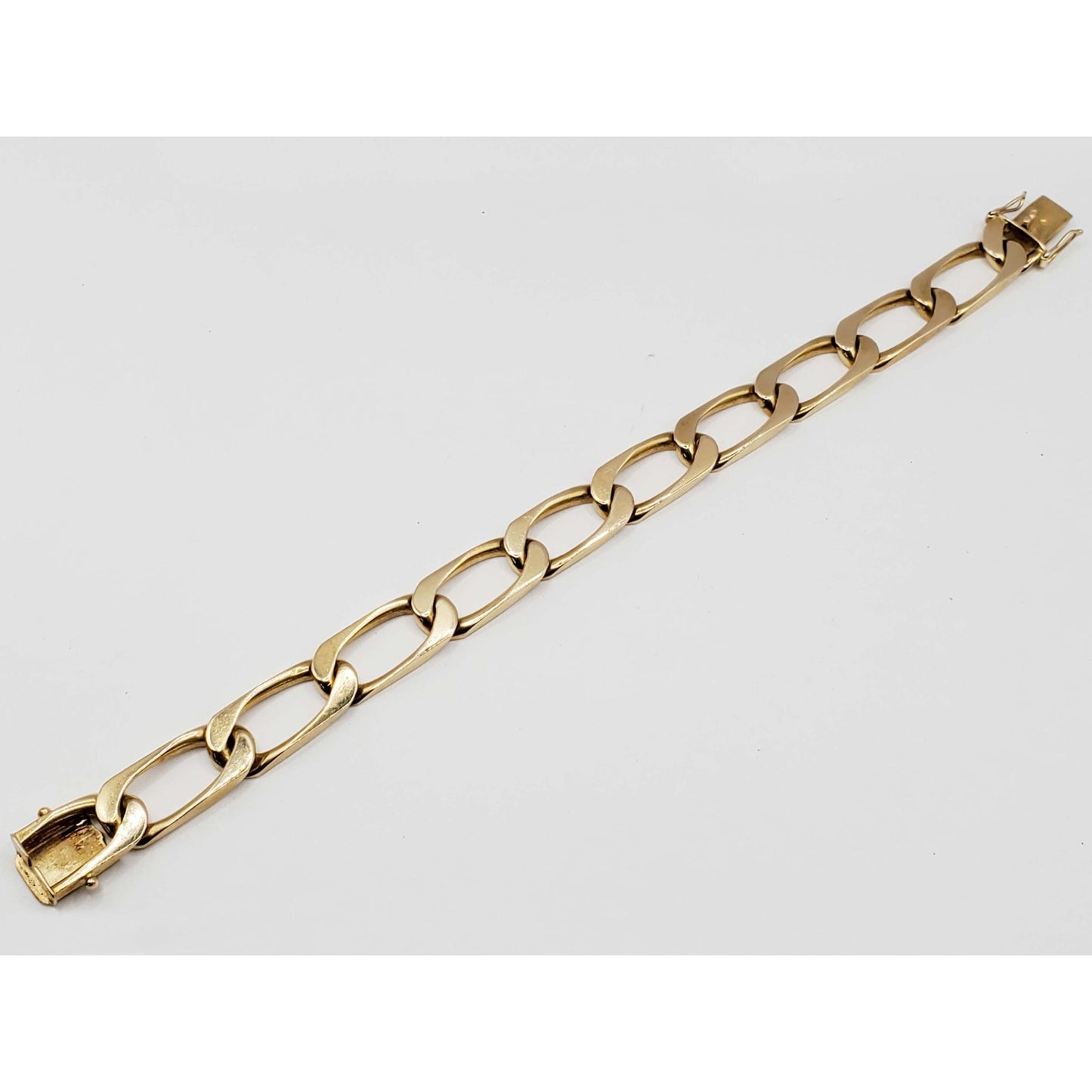 12.5mm Flat Curb Link Bracelet 18k Gold 63.9 Grams