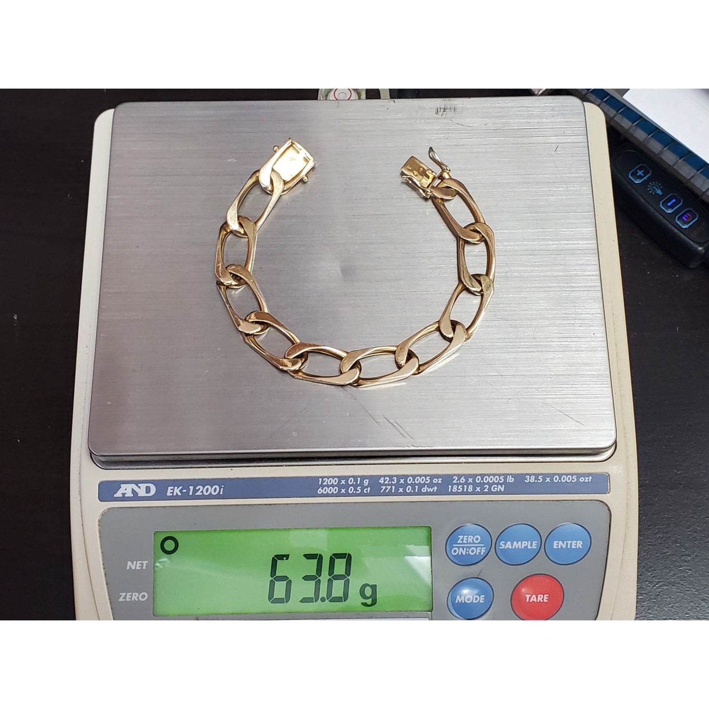12.5mm Flat Curb Link Bracelet 18k Gold 63.9 Grams