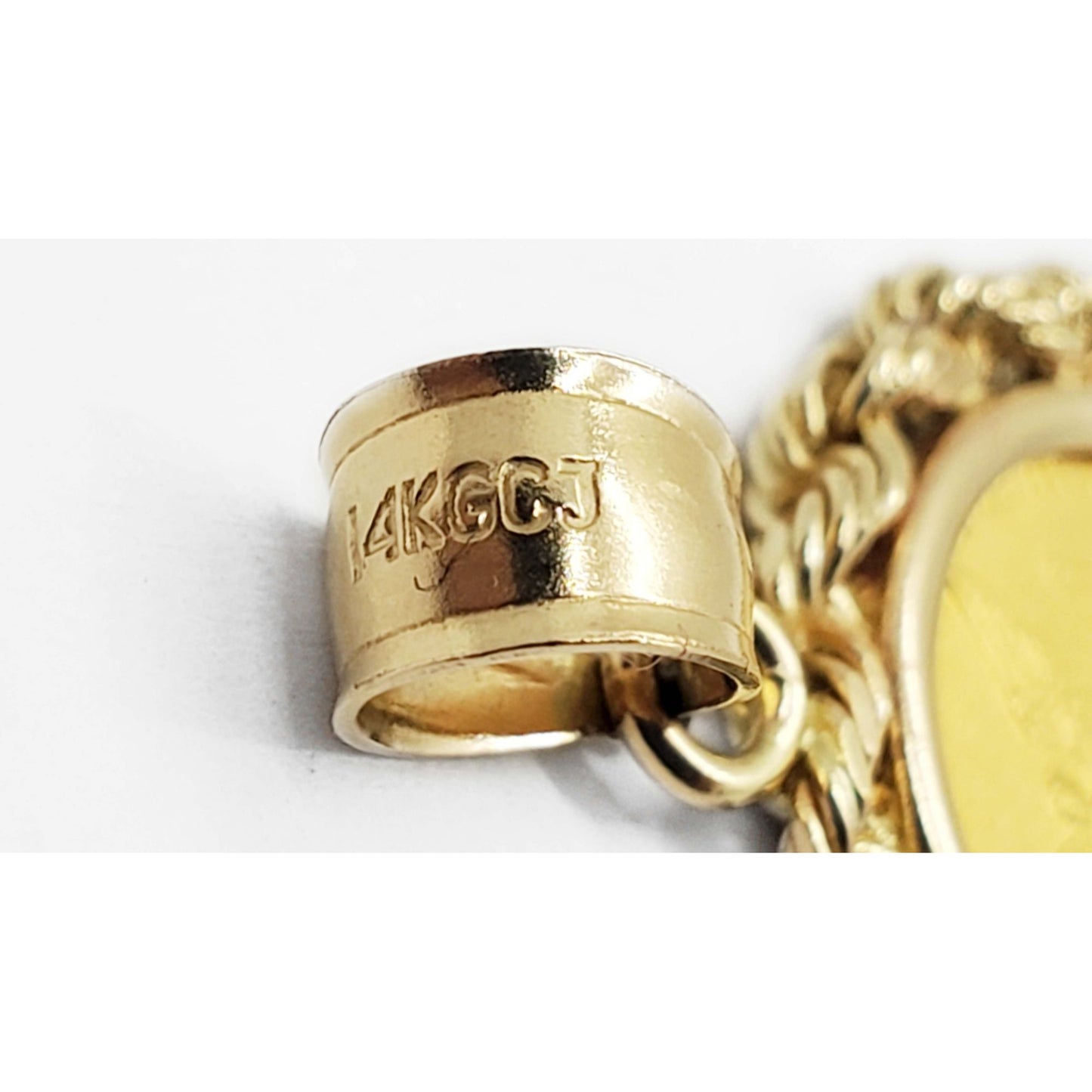 1/20 Troy Oz .9999 Fine Gold Libertad Coin in 14k Gold Bezel Pendant