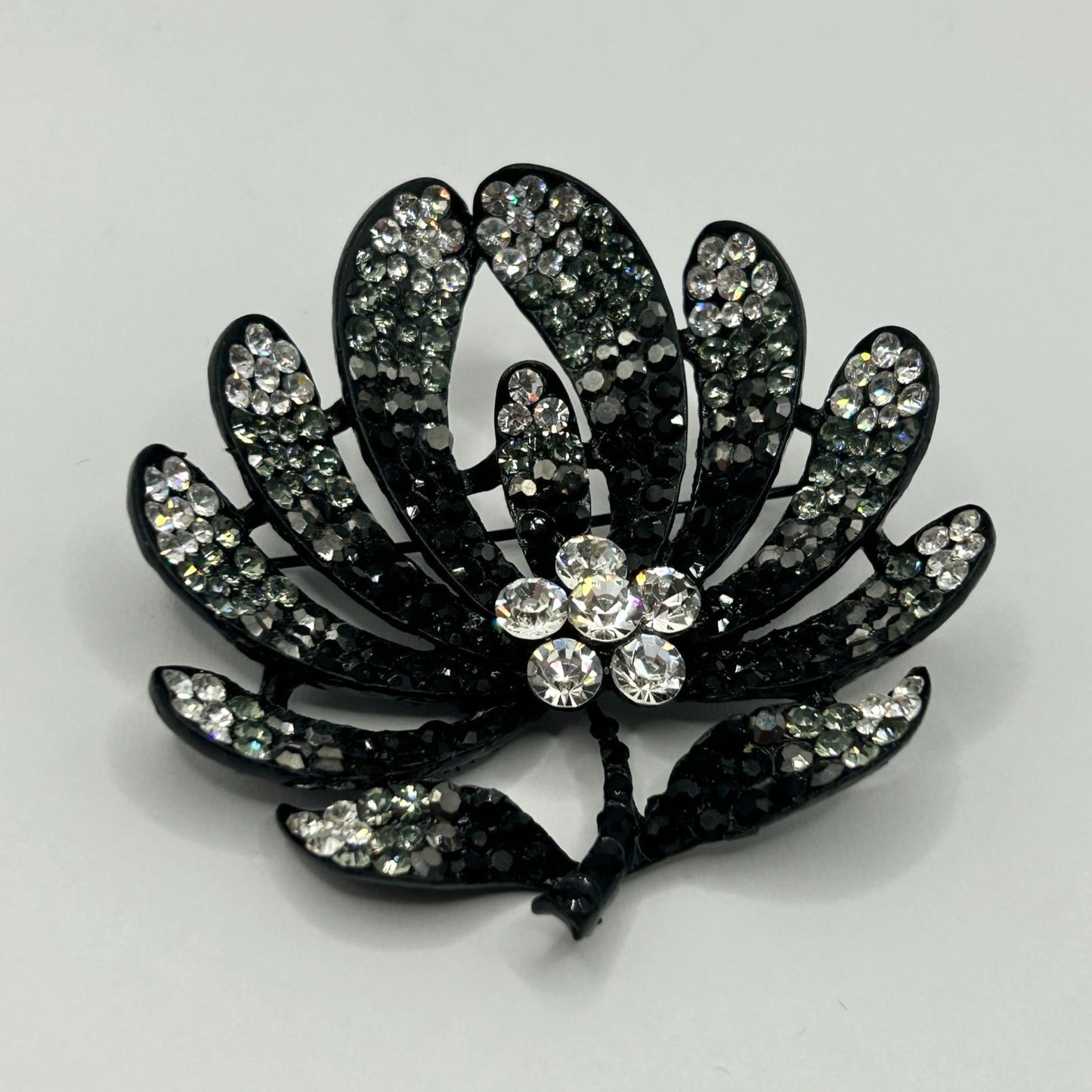Vintage Rhinestone Flower Leaf Brooch Black and Clear Rhinestones