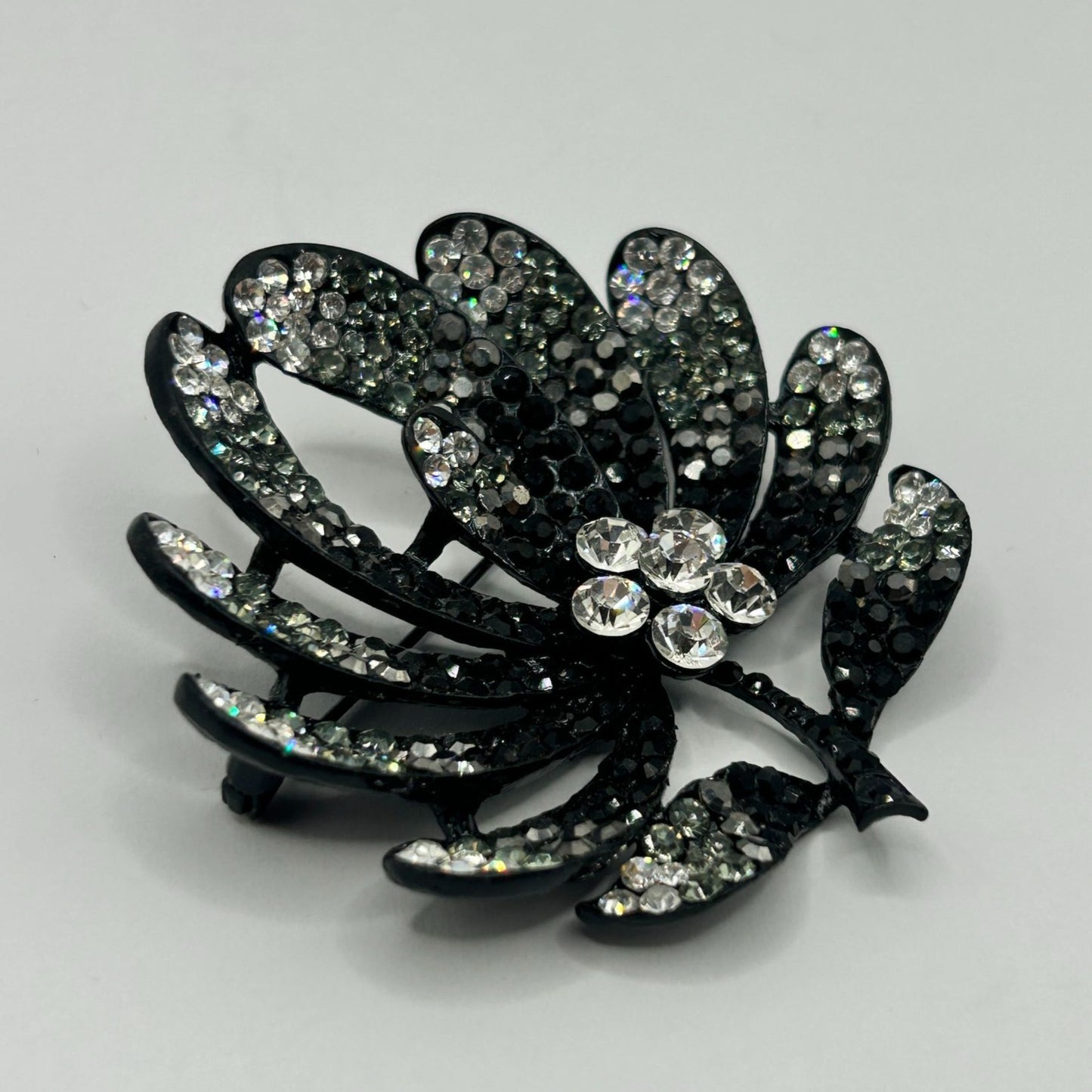 Vintage Rhinestone Flower Leaf Brooch Black and Clear Rhinestones