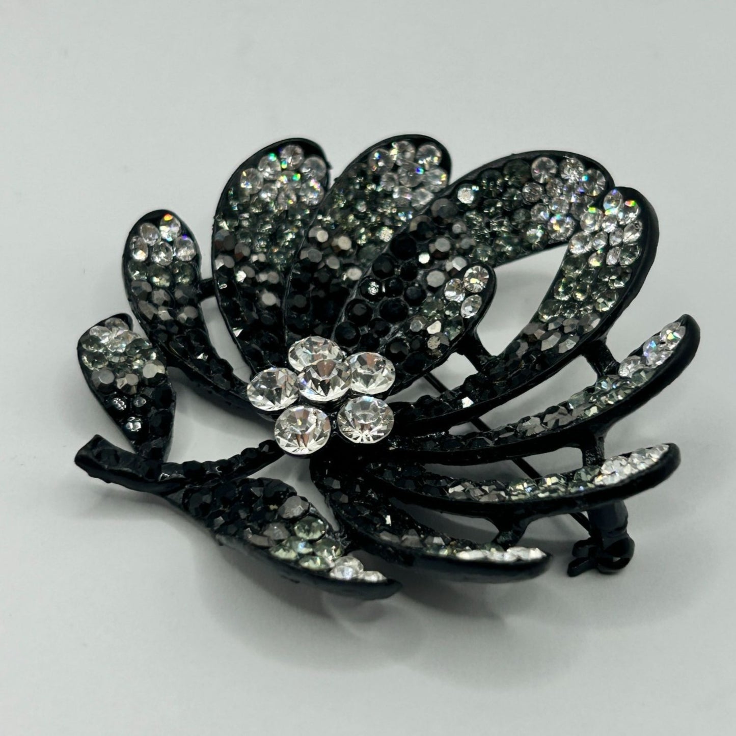 Vintage Rhinestone Flower Leaf Brooch Black and Clear Rhinestones