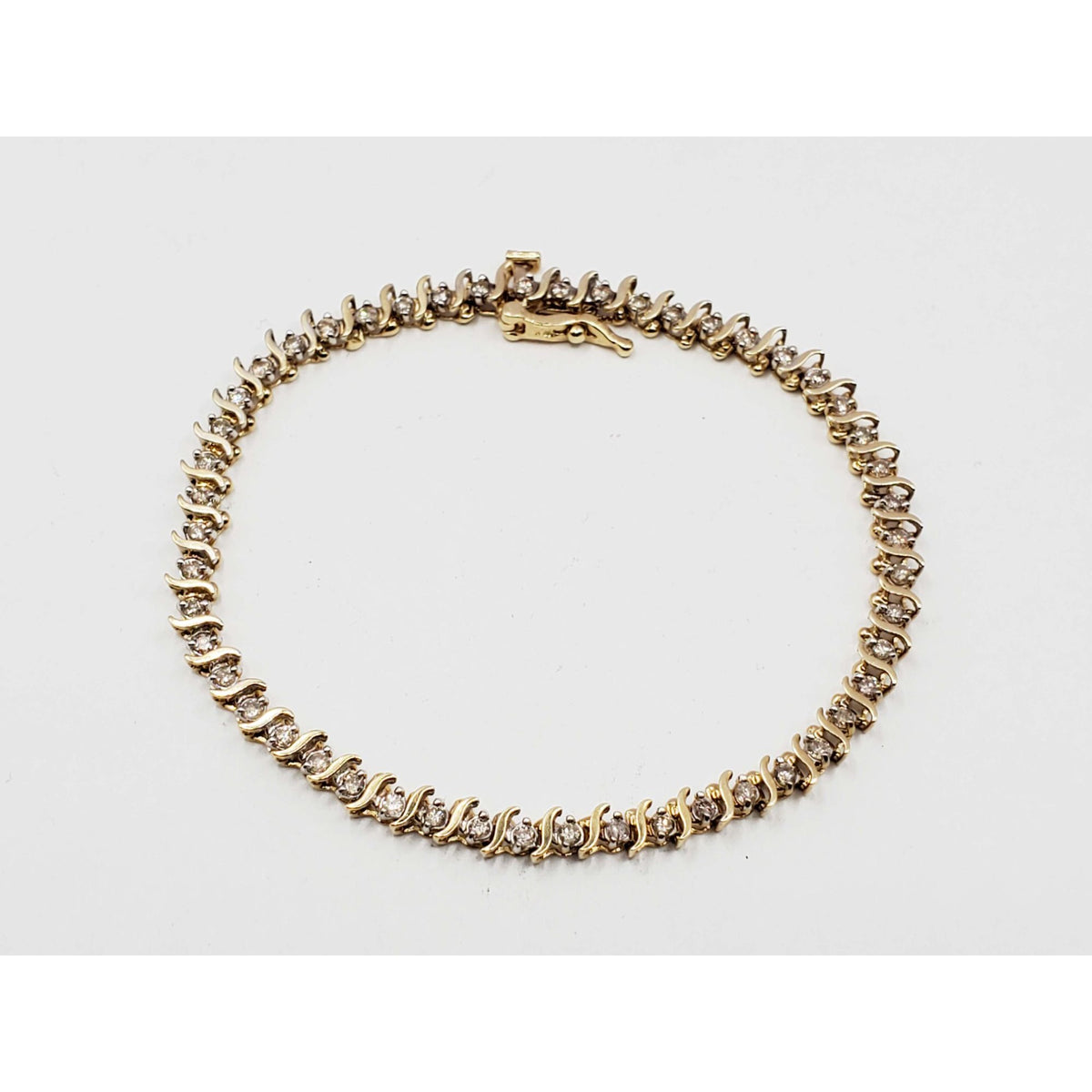 0.7 ctw Diamond 4mm Wide S-Link Tennis Bracelet 14k Gold 7" Long
