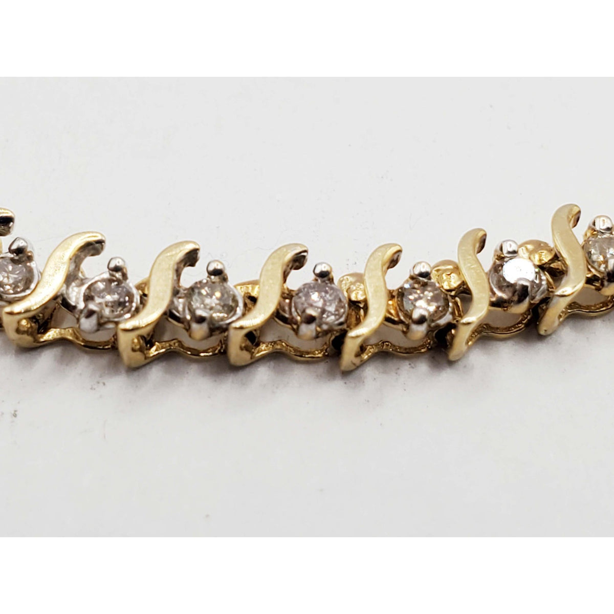 0.7 ctw Diamond 4mm Wide S-Link Tennis Bracelet 14k Gold 7" Long