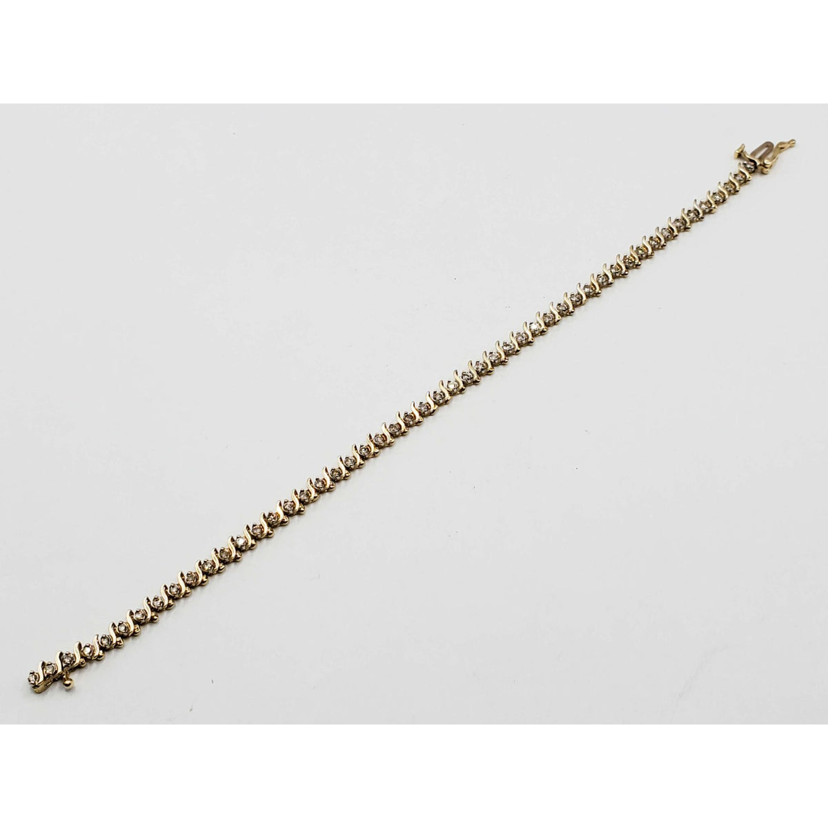0.7 ctw Diamond 4mm Wide S-Link Tennis Bracelet 14k Gold 7" Long